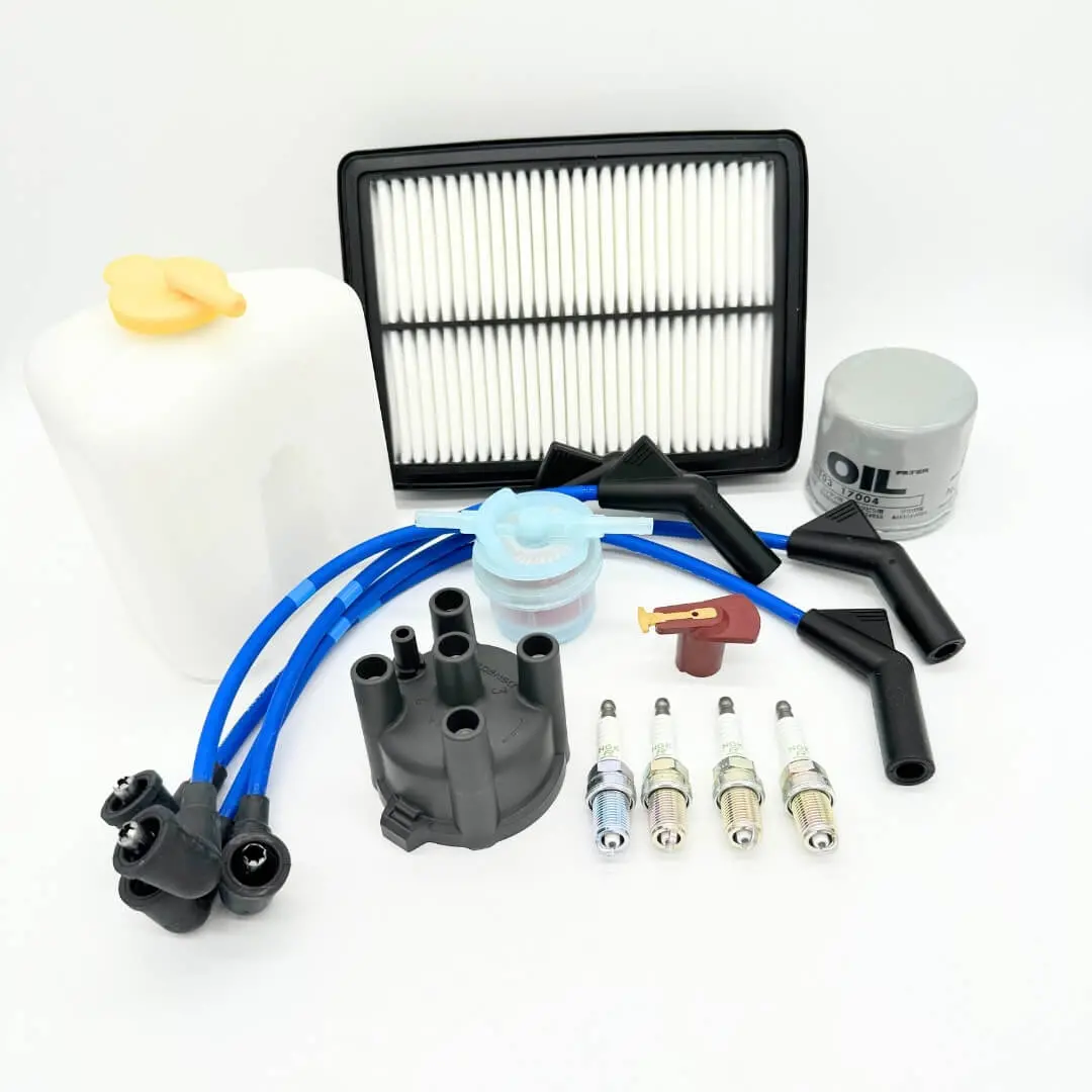 14 Piece Ignition Kit  - Distributor Cap, Rotor, Spark Plugs, Wires,Oil Filter, Fuel Filter, Air Filter & Coolant Reserve Tank - Subaru Sambar Van Kv3, Kv4 Models - 1990-1998 1